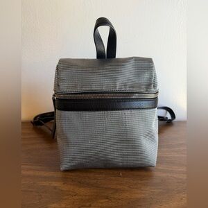Kara backpack purse, metallic woven webbing, real pebbled leather trim, EUC